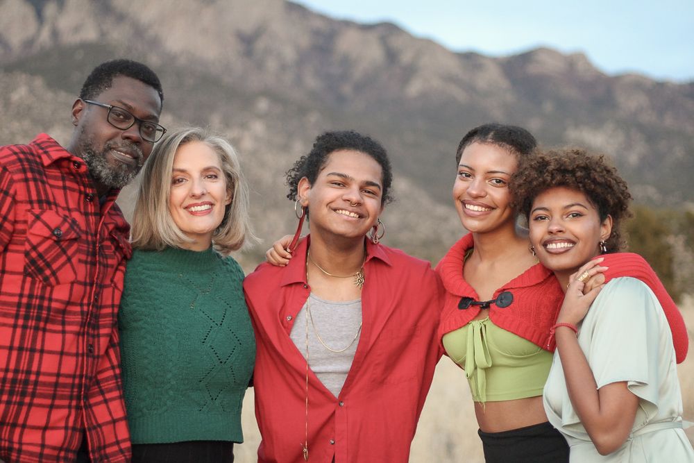 Family of five in the Sandia Foothills during a holiday portrait session.