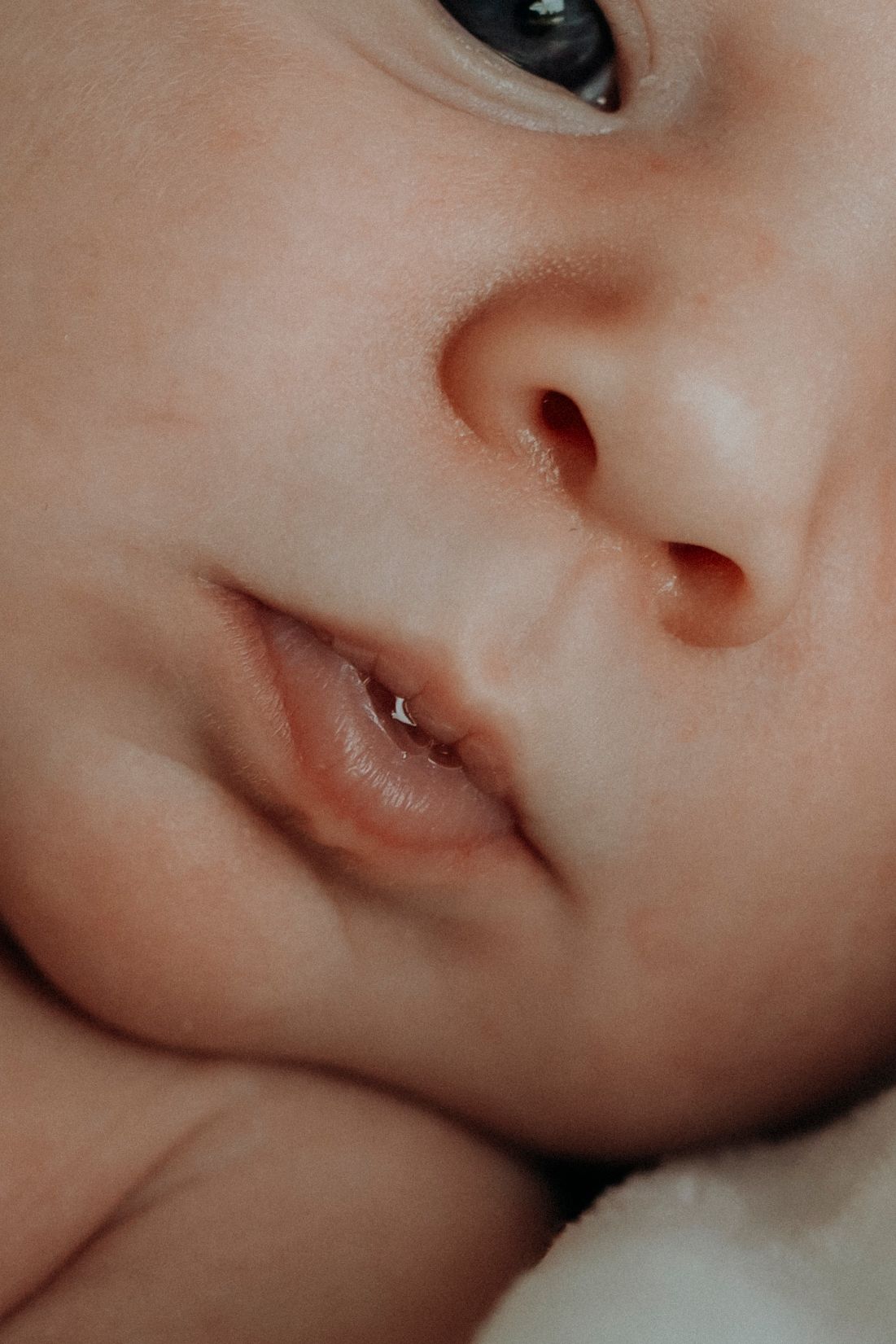Extreme close-up shots of a baby's delicate facial features.
