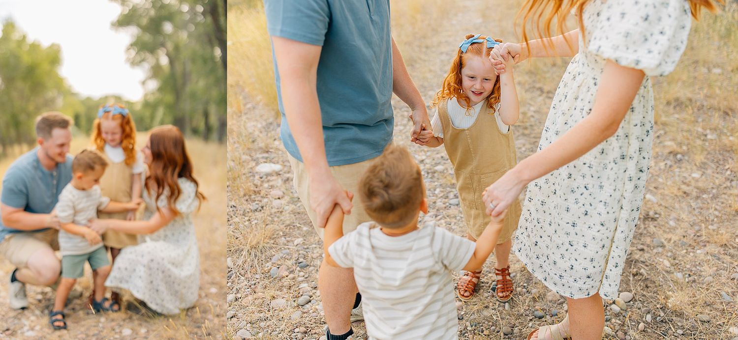 Family enjoying playful moments together on a sunny day in a rustic outdoor setting.