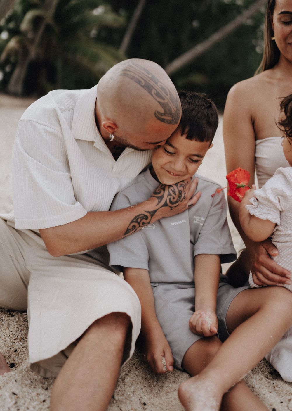 A series of tender moments showing a parent kissing a child's knee injury in a sequence of healing comfort photos.