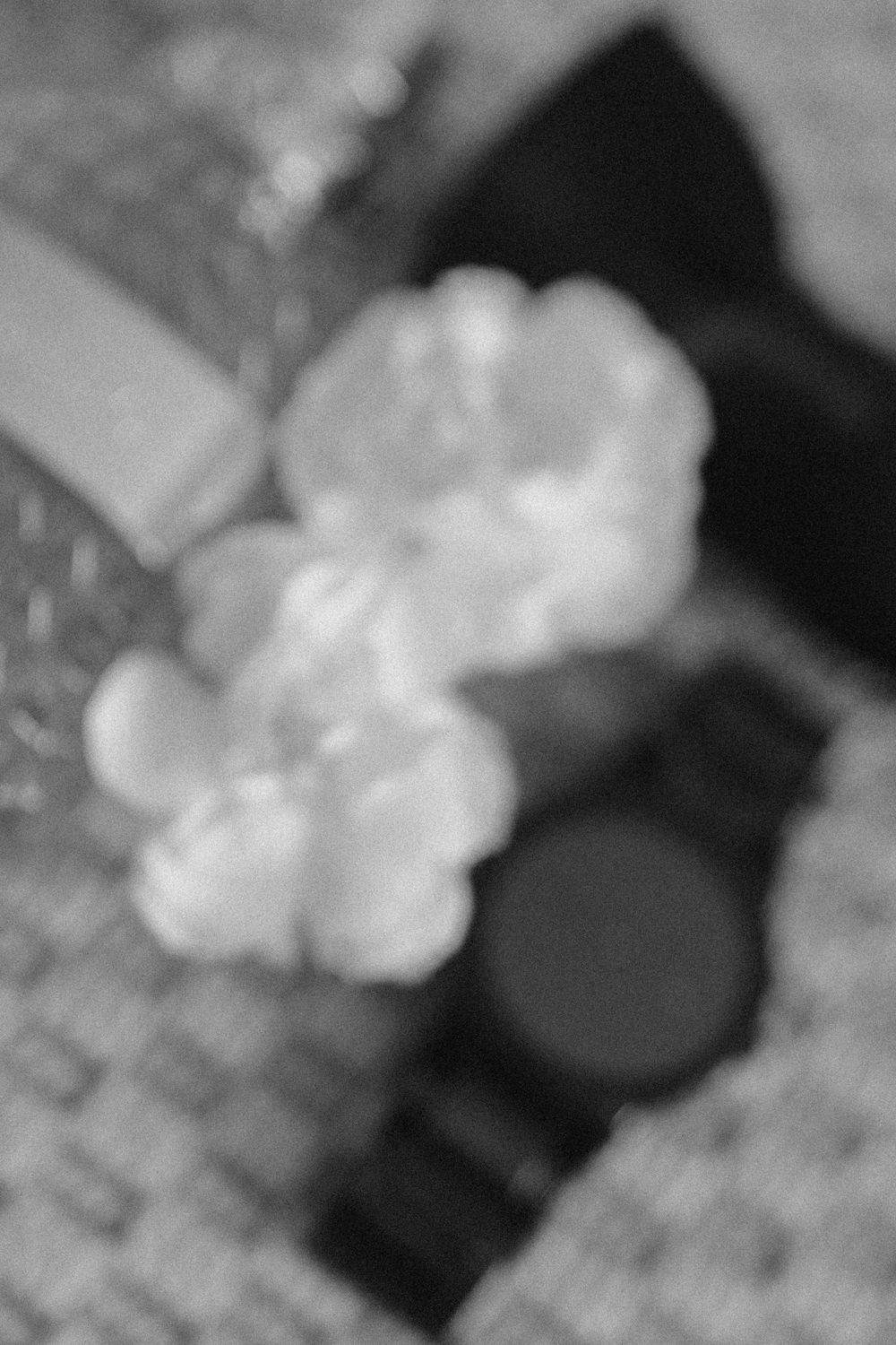 Time-lapse sequence showing cloud formations developing and changing shape in black and white photography.