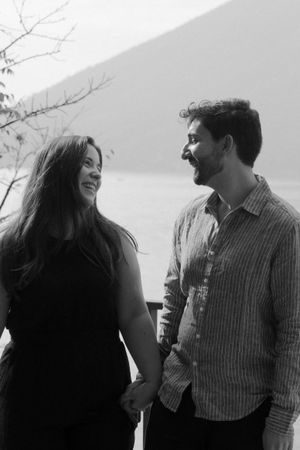 A black and white photo sequence showing a couple laughing and sharing a candid moment together outdoors.