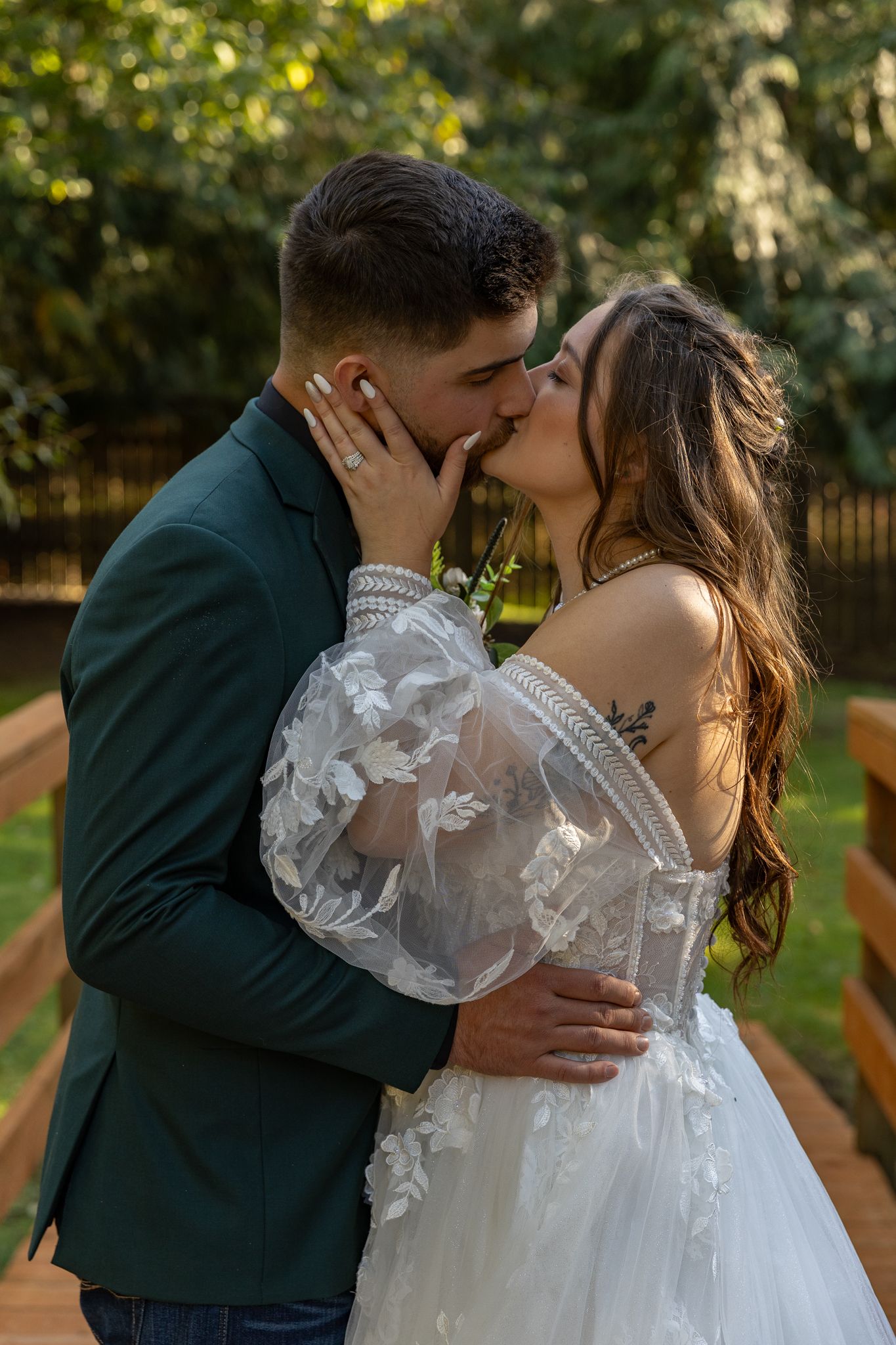 Bride and groom during bridal portraits in the forest.