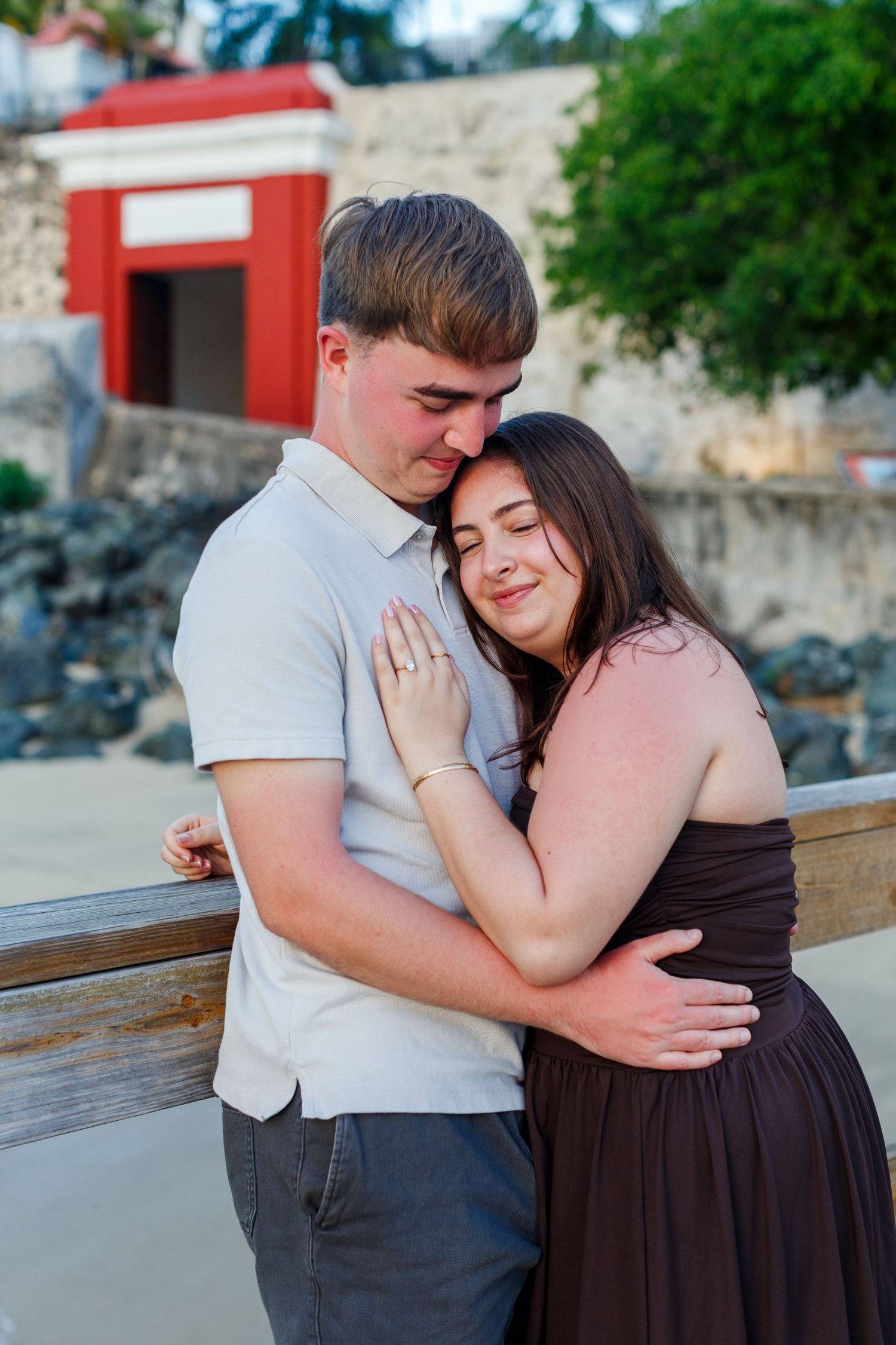 Couples portrait at the Floating Platform with the Puerta de San Juan in the background. Old San Juan, Puerto Rico.