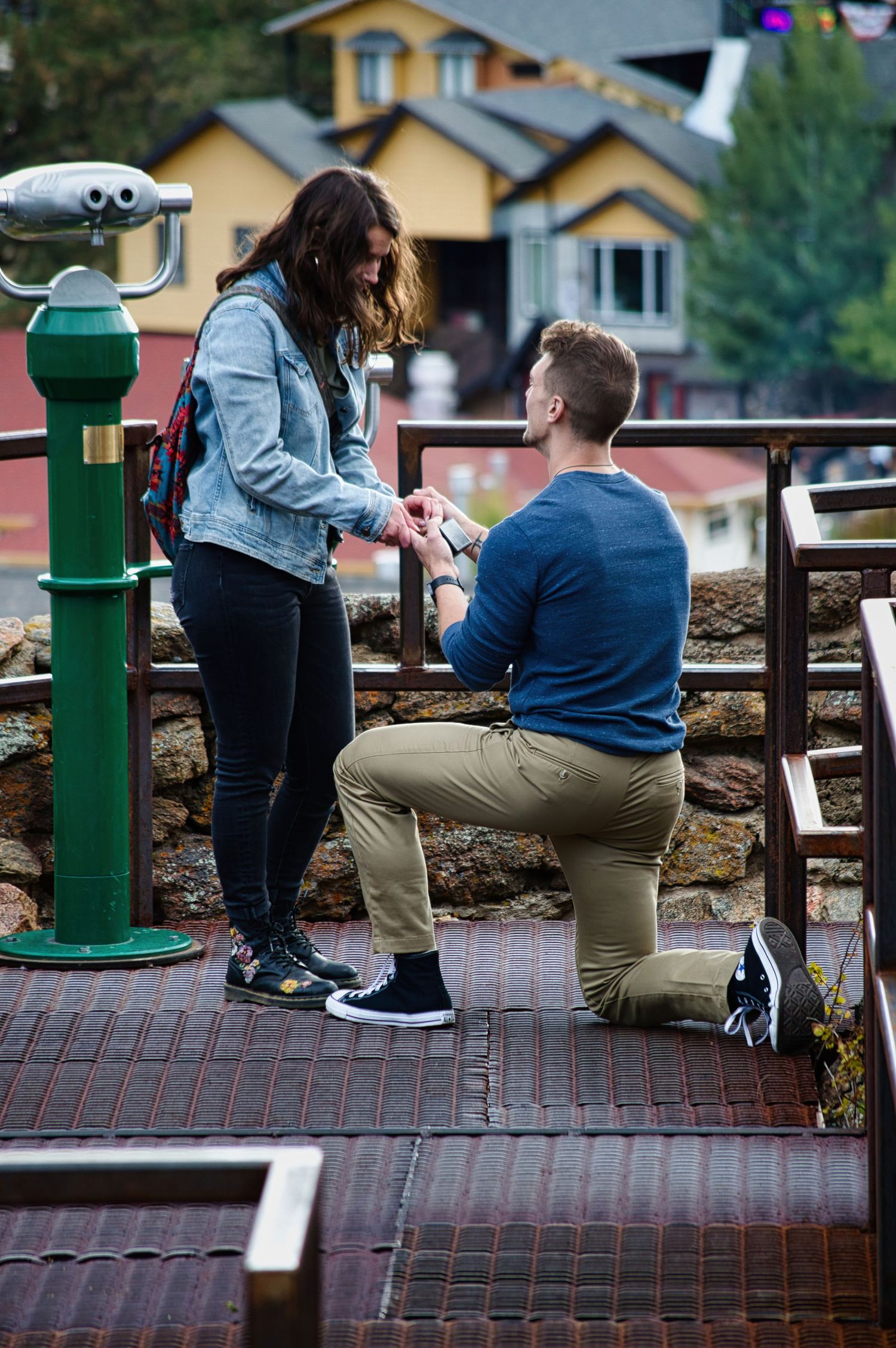 He hit one knee in Estes Park and she said yes. Pixcapades | The Rocky Mountain Proposal Photographer