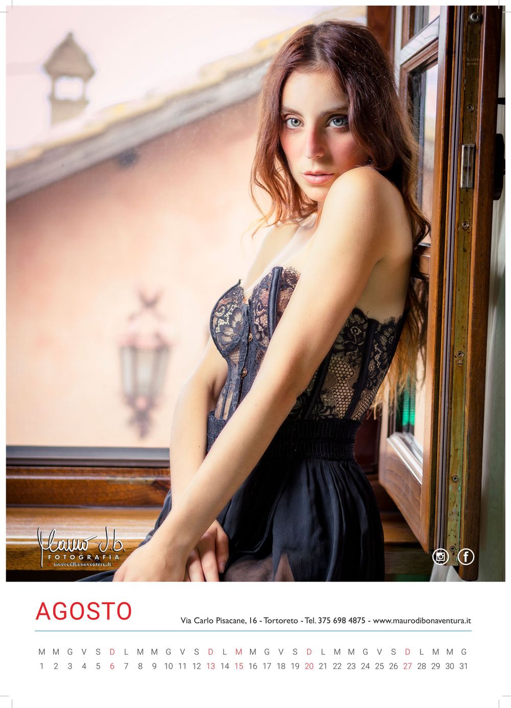 Calendar photo showing artistic fashion portrait by a window with vintage lanterns.