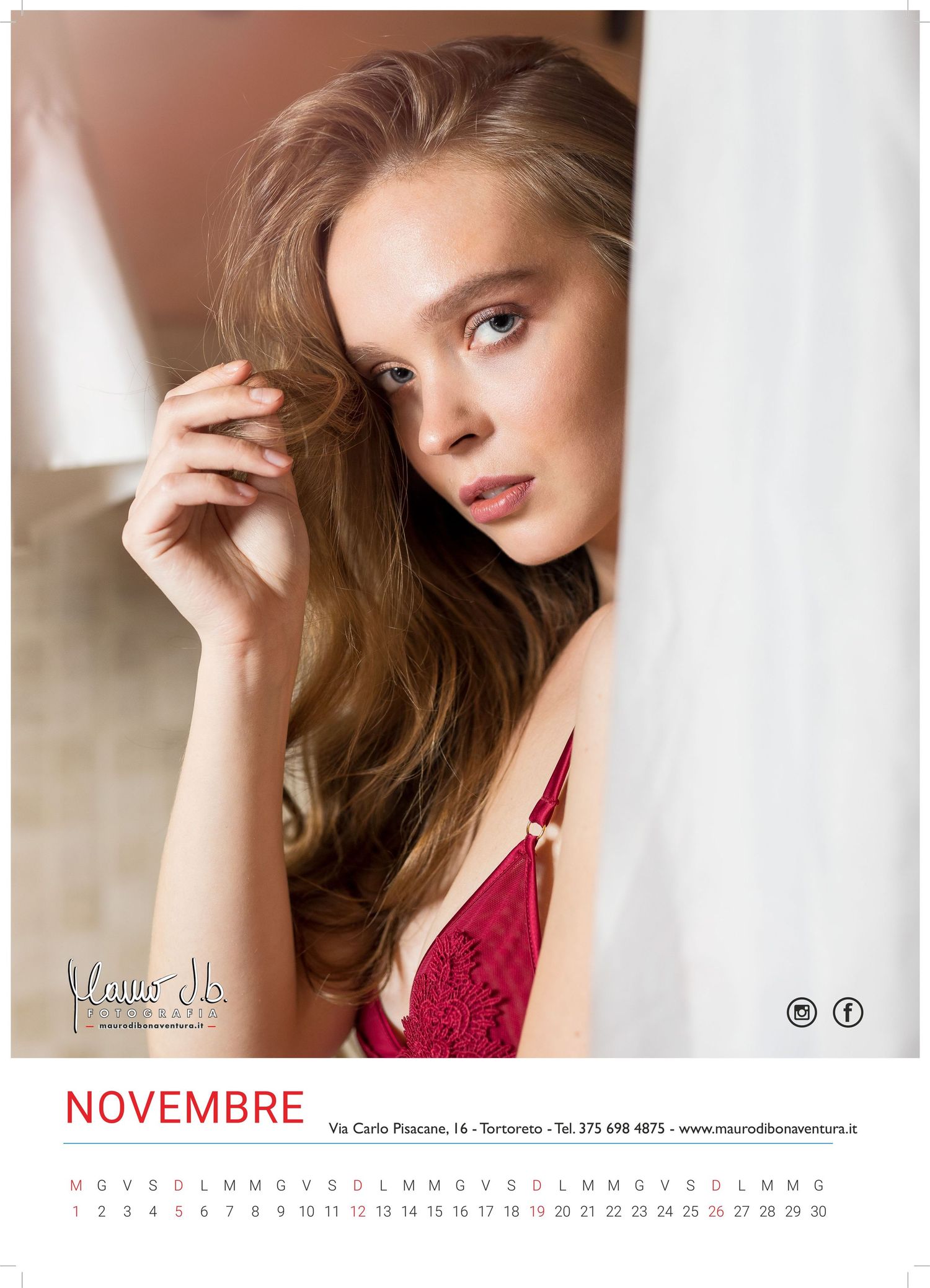 Calendar page featuring soft portrait photography in natural window light.
