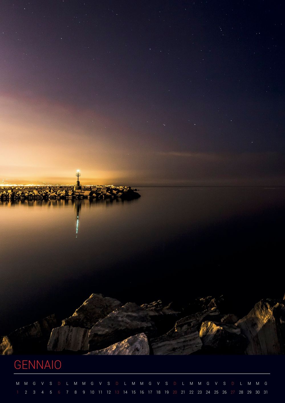 Nighttime seascape with illuminated pier and starry sky reflecting on calm water.