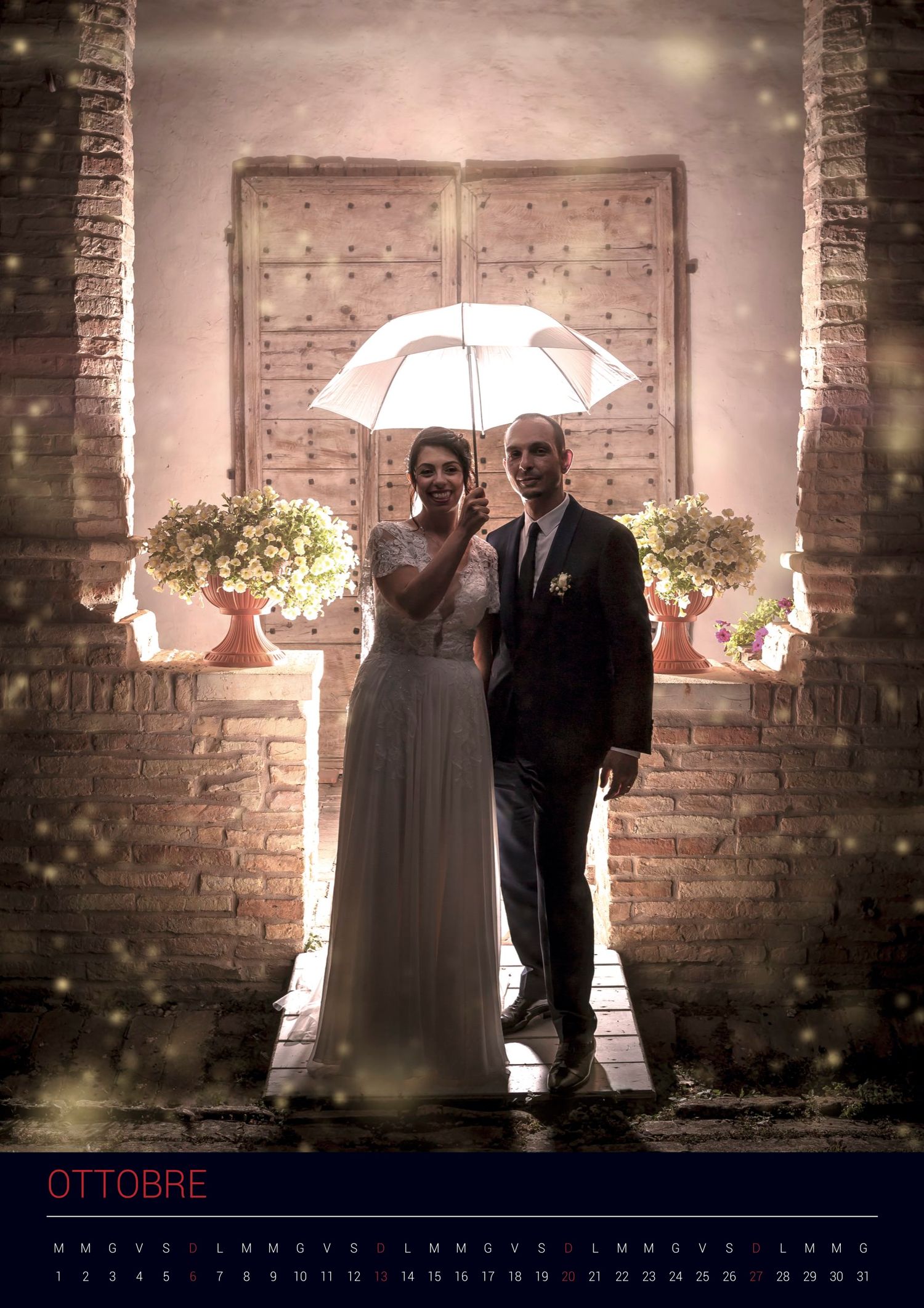 A romantic wedding photo with a couple holding a white umbrella against antique wooden doors and brick columns in sepia tones.