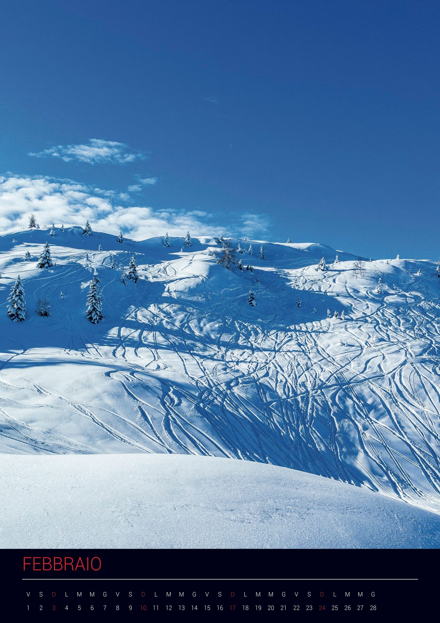 Snow-covered mountain slopes with ski trails and chairlifts under bright blue sky during winter in February.