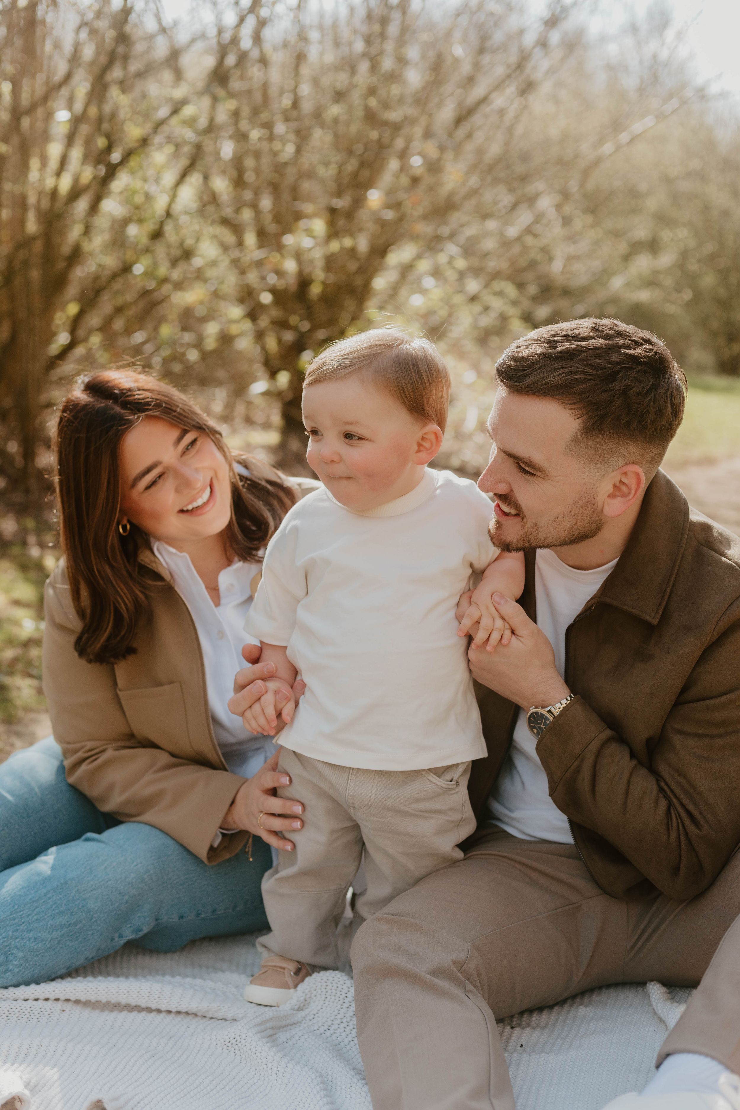 Family smiling in outdoor setting in Dartford Kent