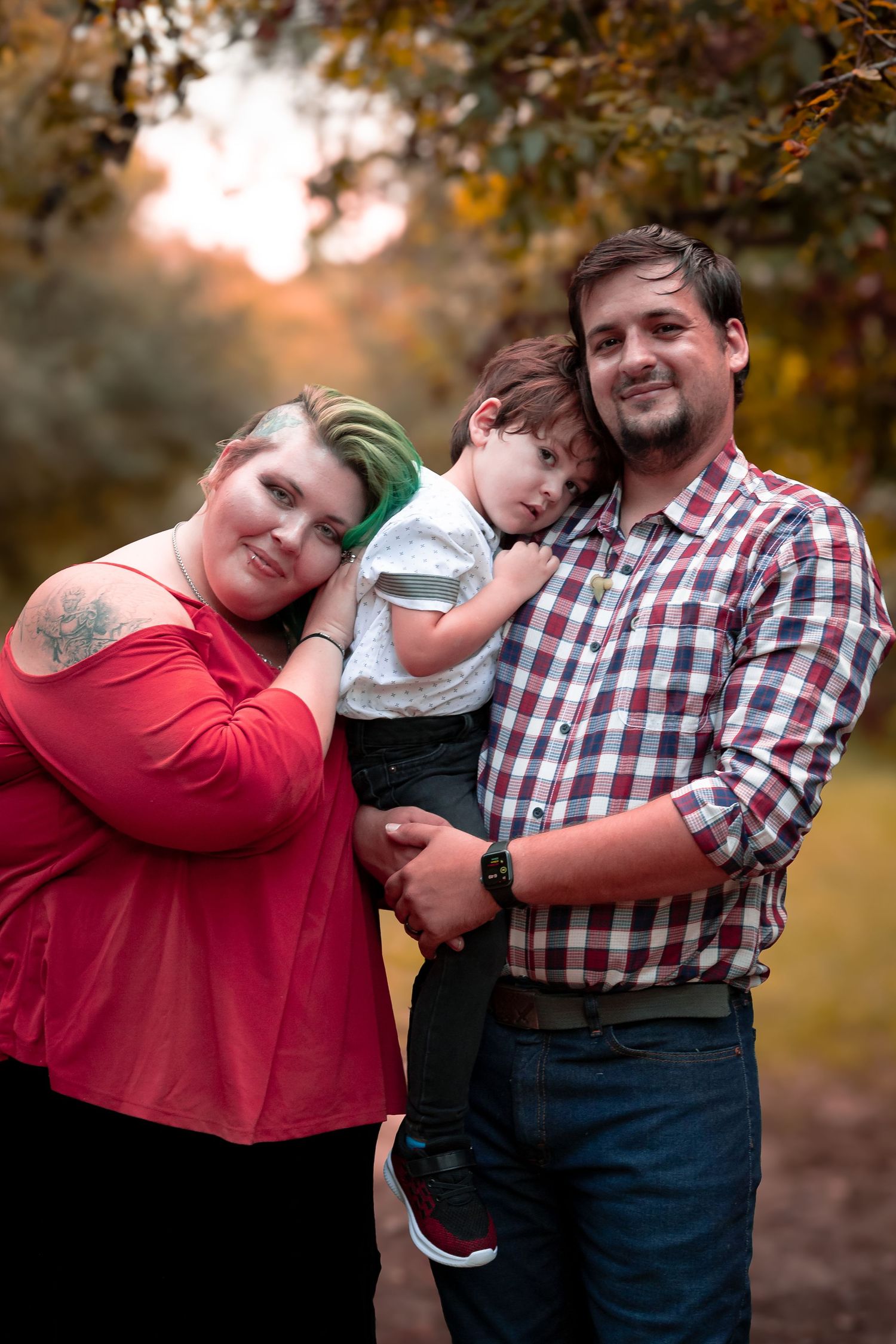 Family photo session showing playful moments in autumn setting.