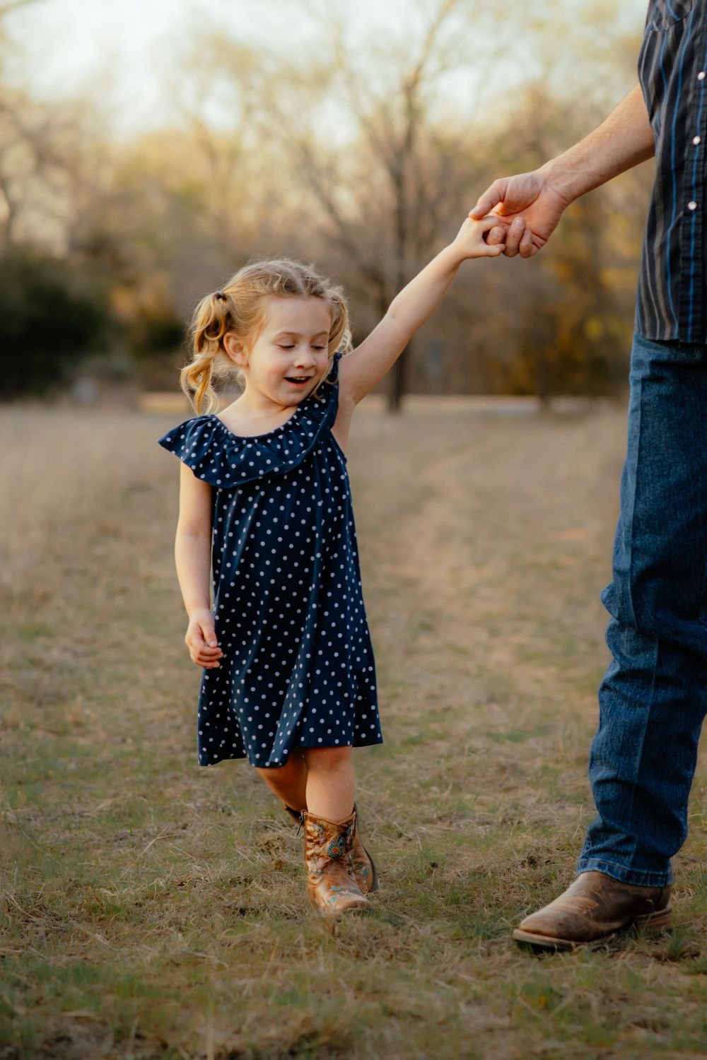 Dad and daughter dance during their Oklahoma Lifestyle Family Photos.