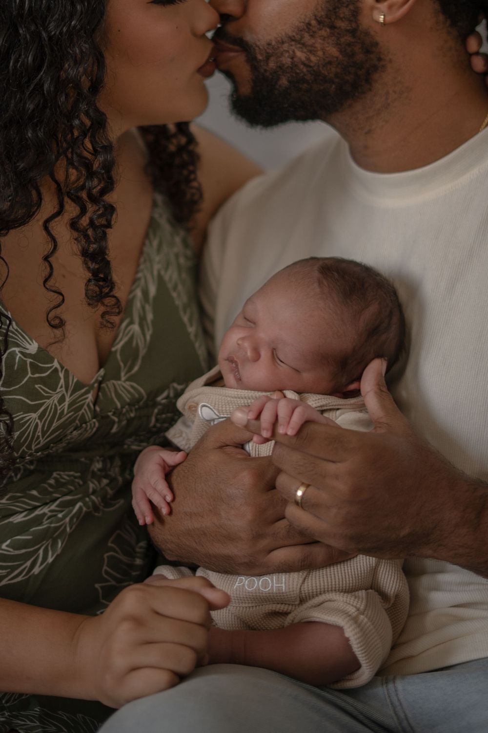 Newborn baby sleeping peacefully in cozy indoor setting.