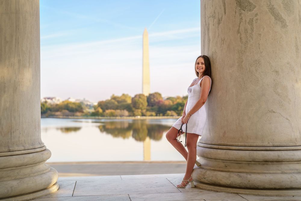 A series of photos showing graduate posing between white marble columns at sunset in a classical architectural setting, in washington dc
