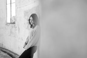 Kirstie Fitzpatrick, weather presenter and Journalist from 7 News Regional wearing a grey knitted top with black jeans captured in B+W.