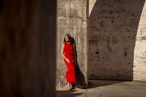 Kirstie Fitzpatrick, weather presenter and Journalist from 7 News Regional wearing a red dress at the Mount Stromlo Observatory