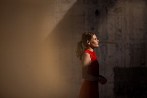 Kirstie Fitzpatrick, weather presenter and Journalist from 7 News Regional wearing a red dress at the Mount Stromlo Observatory