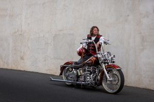 Albury DJ and Identity Steve Bowen standing with his Harley Davidson Motorcycle in Albury.
