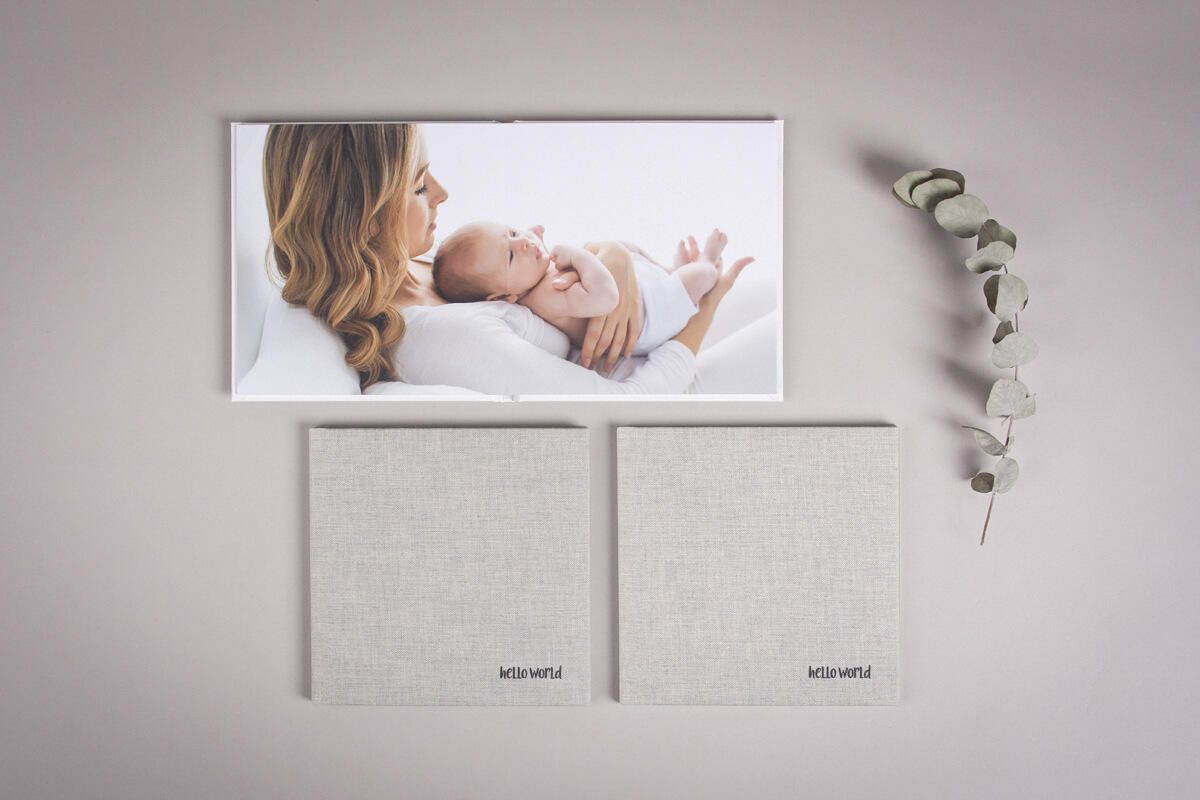 A collage of black and white maternity and newborn photography studio images arranged in a horizontal layout.