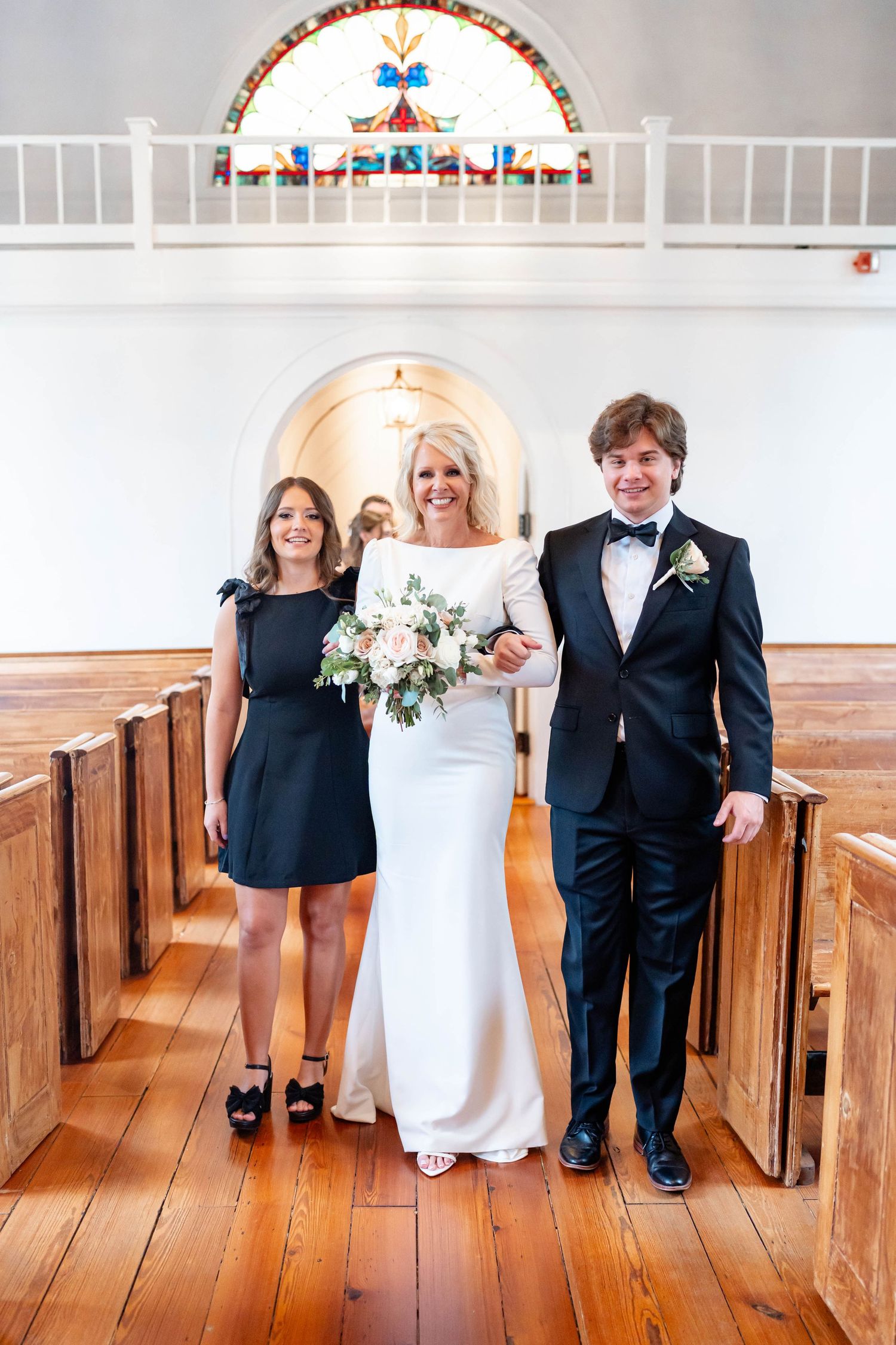 bride walking with her children