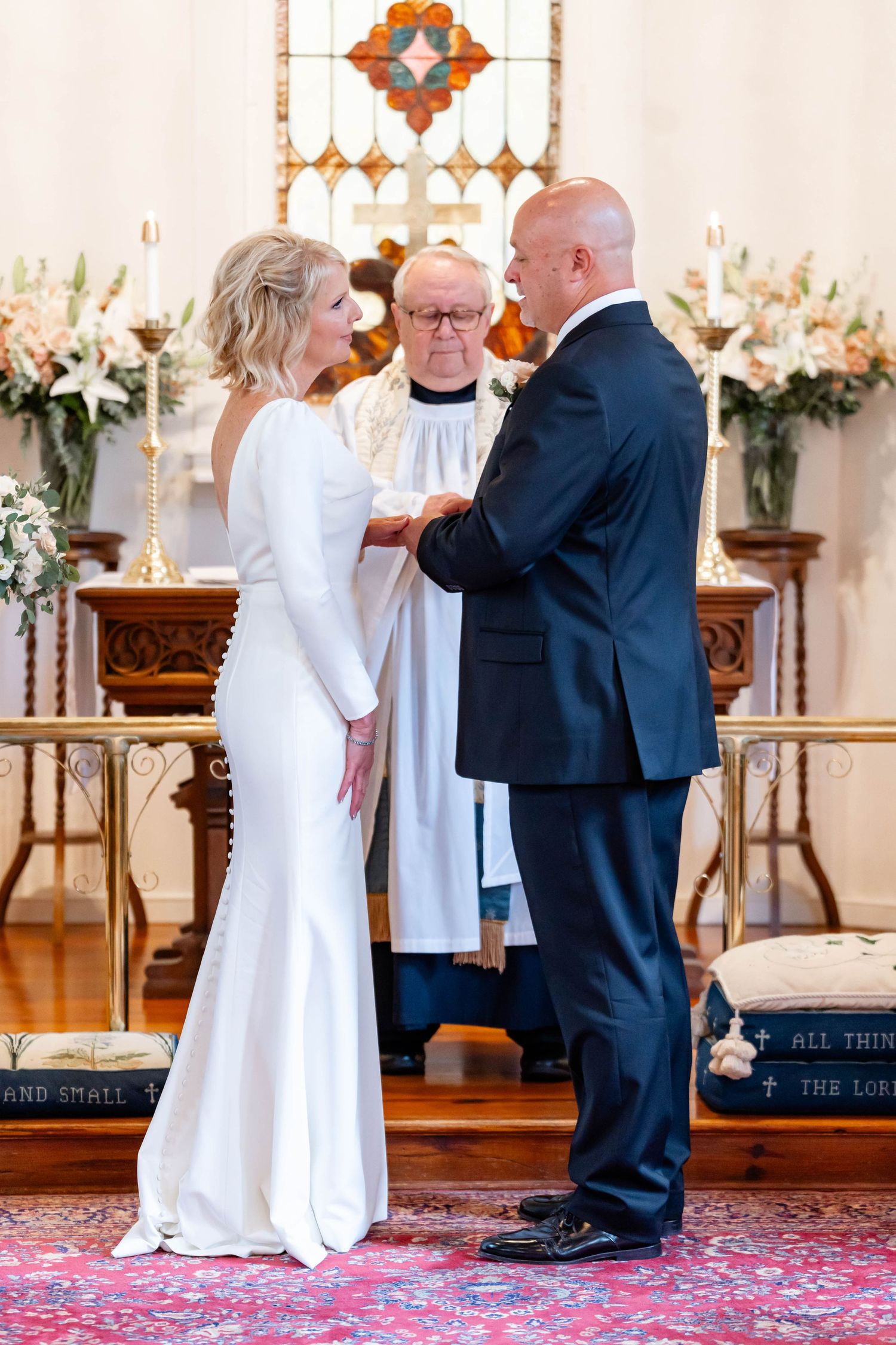 bride and groom at altar at Christ's Episcopal Church in Convington, LA