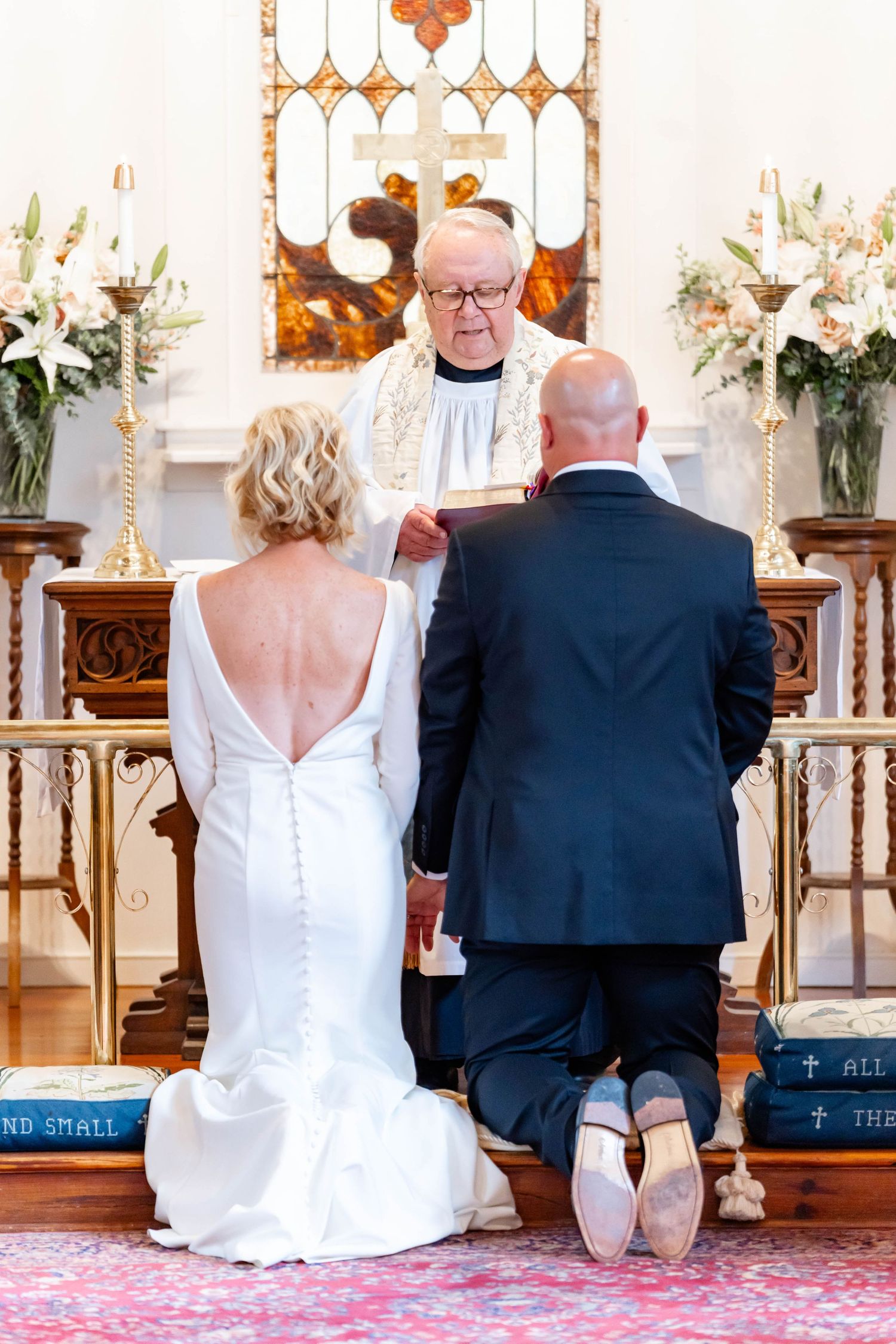 bride and groom at altar at Christ's Episcopal Church in Convington, LA
