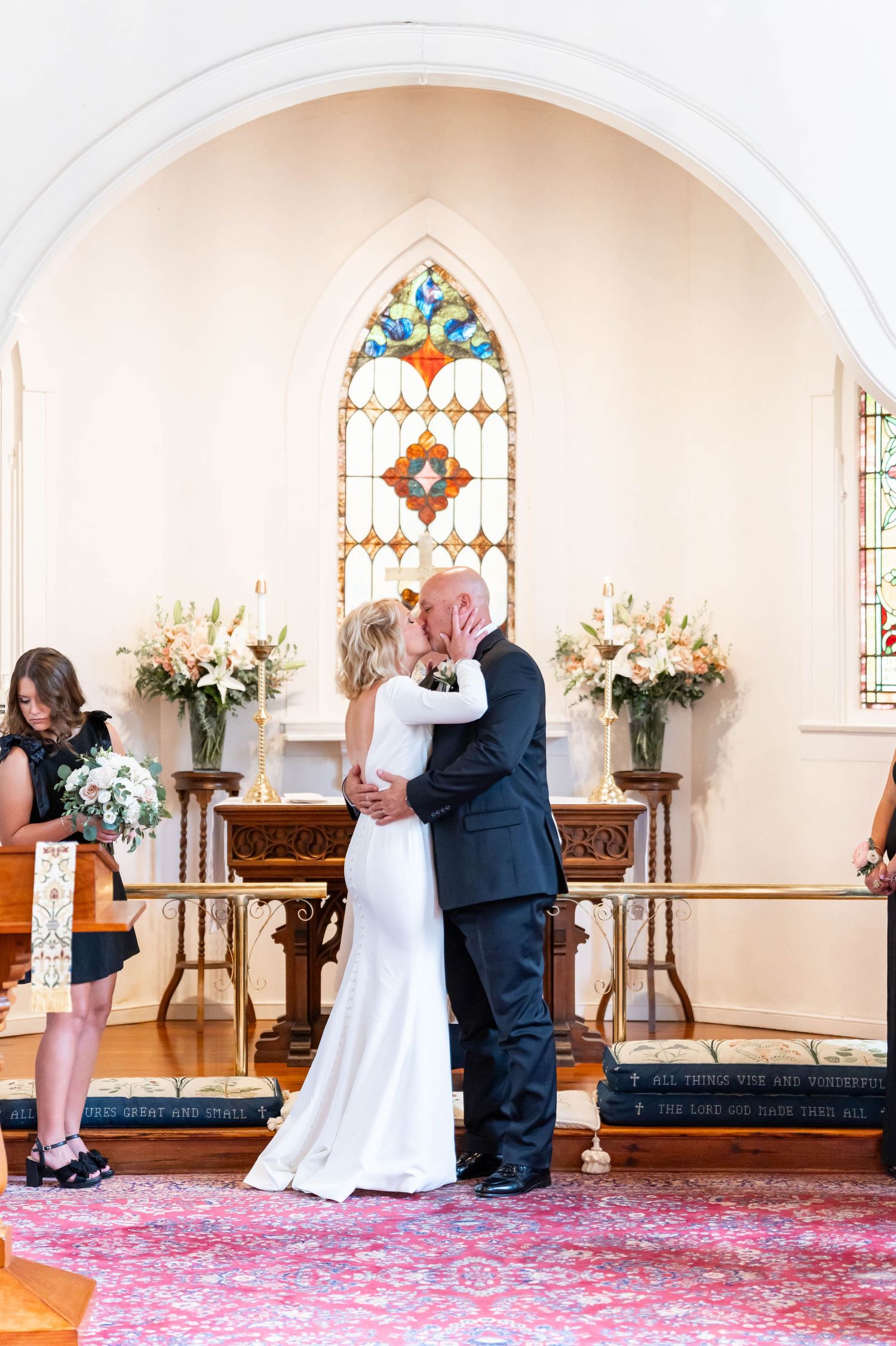 bride and groom kiss at Christ's Episcopal Church in Convington, LA
