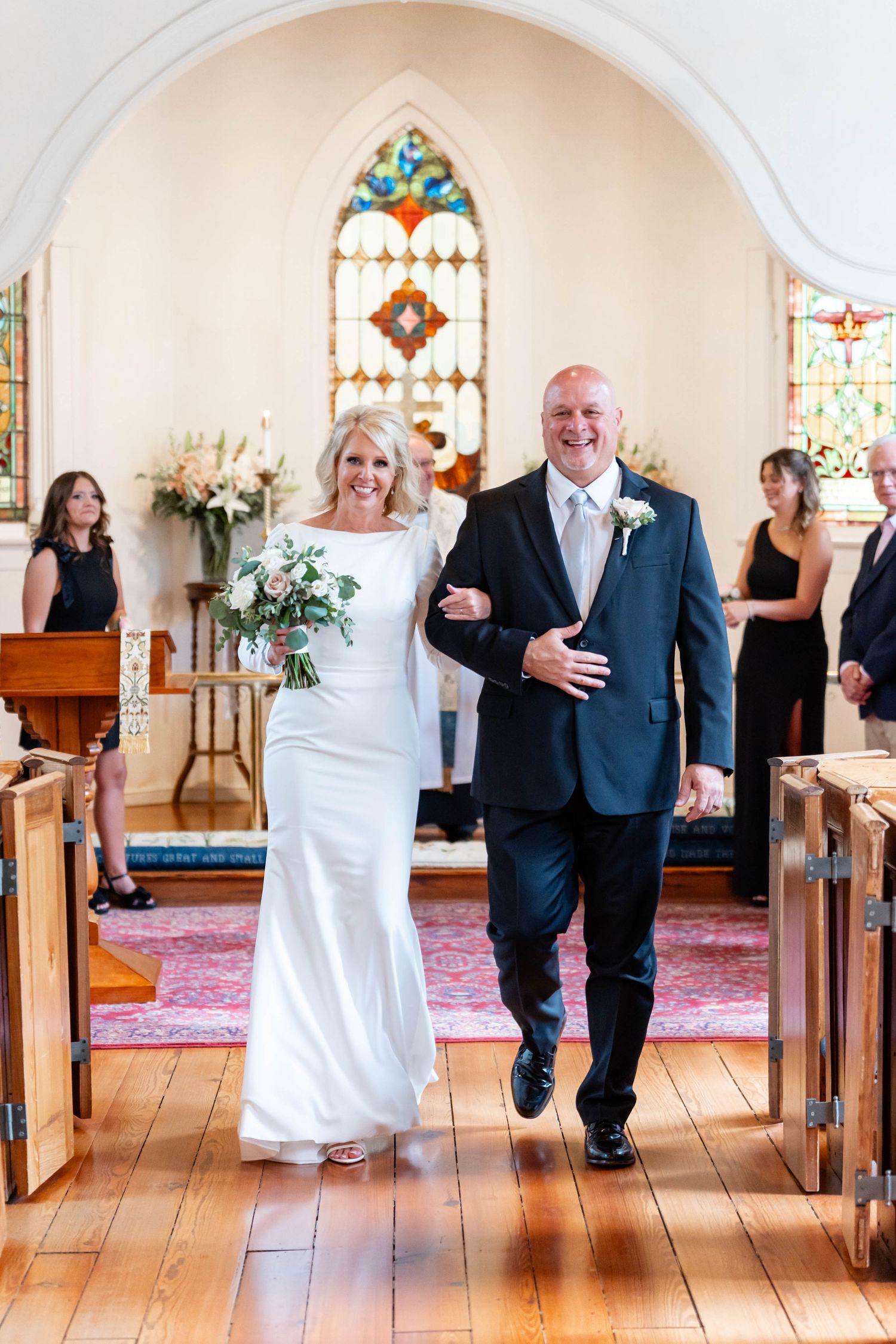bride and groom exit at Christ's Episcopal Church in Convington, LA