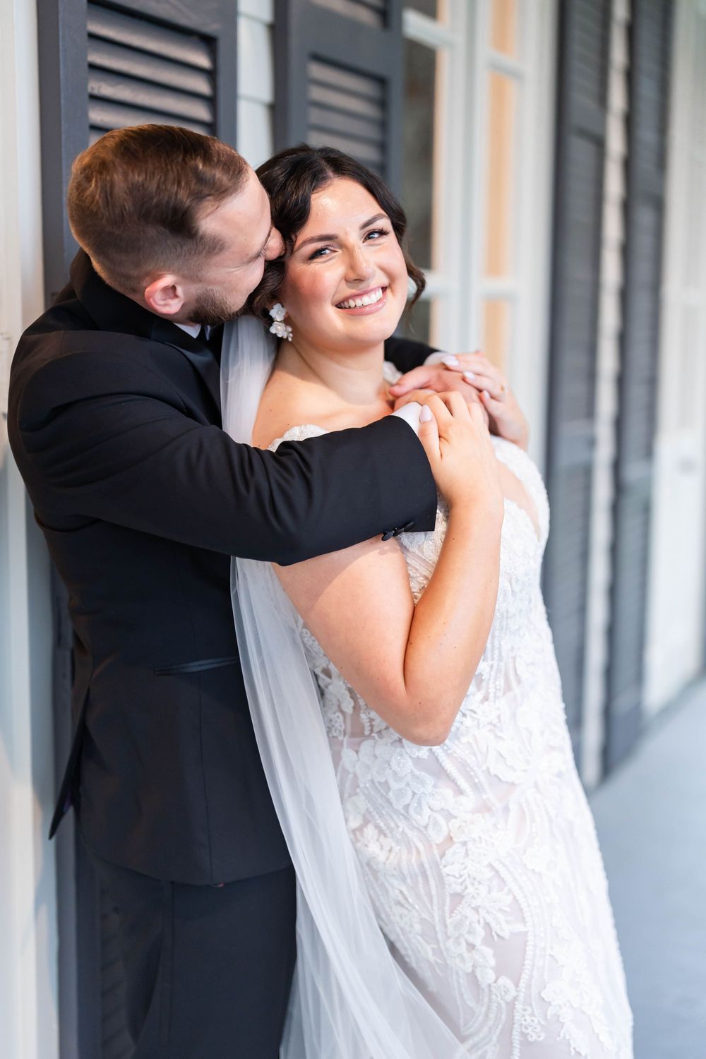 groom kisses bride