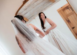 A bride in a white wedding dress poses in a series of elegant photos showing different angles and poses in a sunlit room.