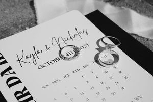 Black and white calendar pages with handwritten text and numbers arranged in a diagonal layout.