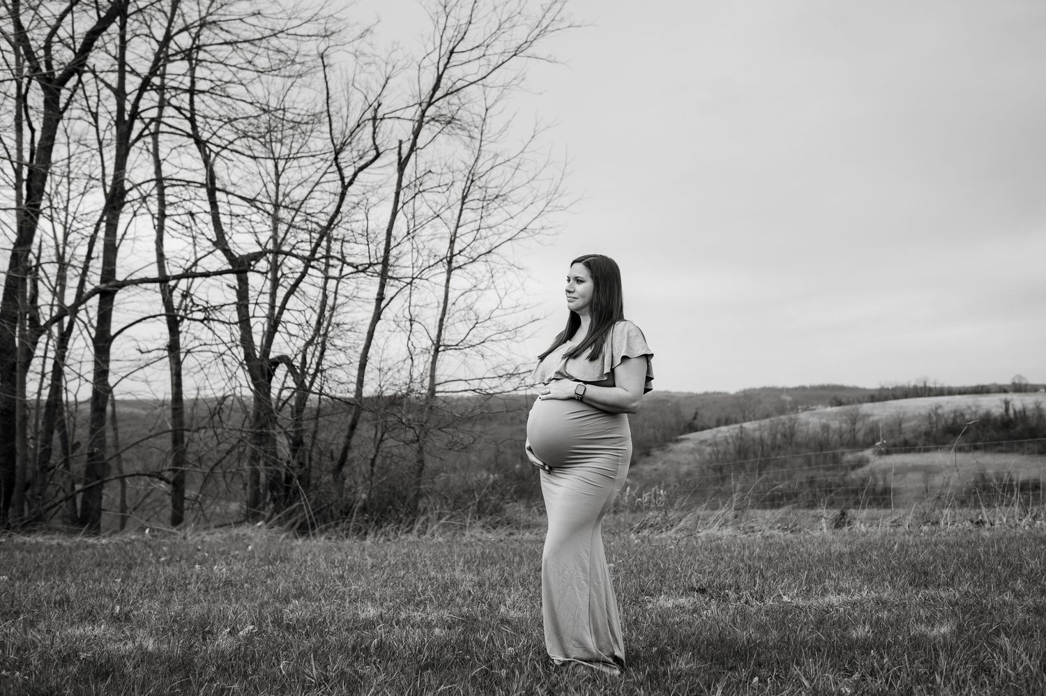 a stunning mother anticipating her second child being born