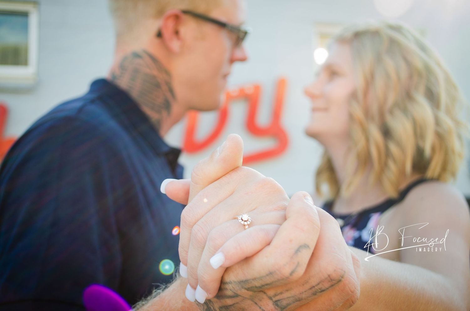 A couple dancing together during a romantic celebration.
