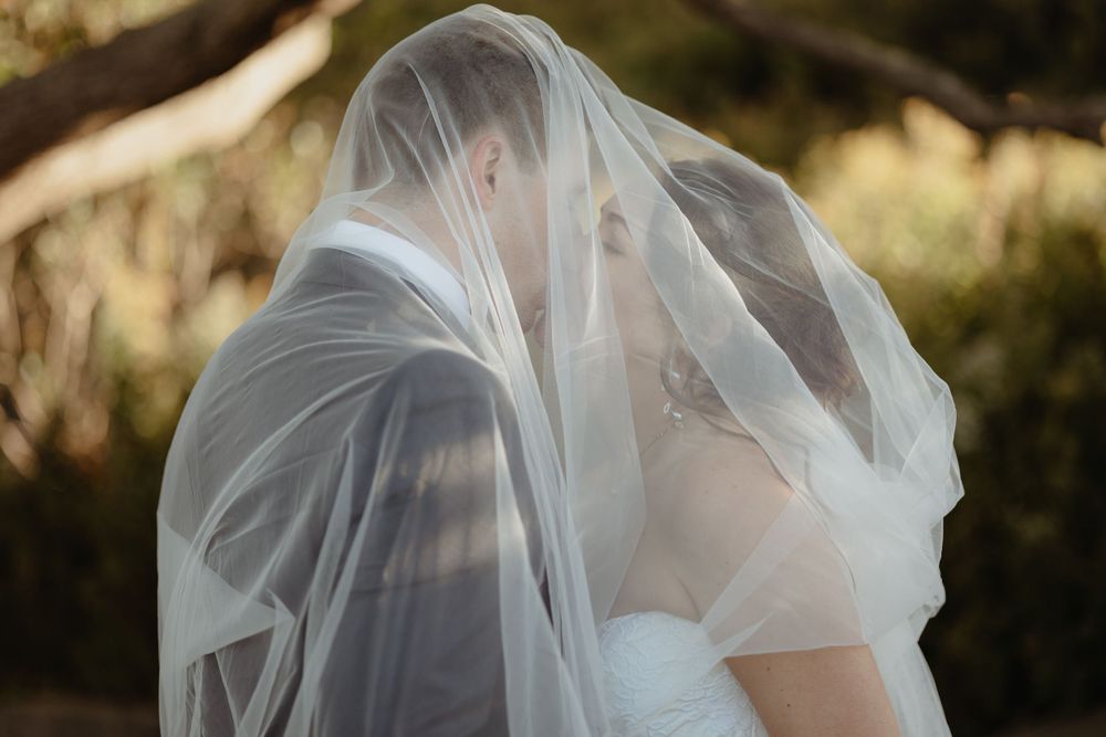 Under the veil posing ideas for couples who are shy.