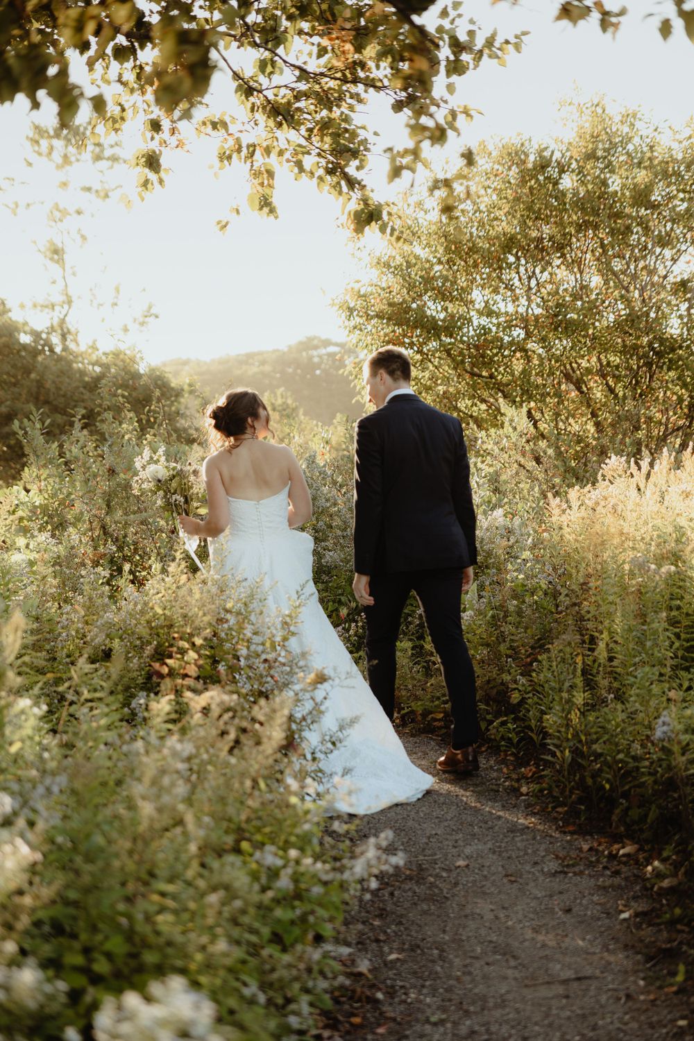 Bride and groom exit their intimate elopement in Portland, Maine.