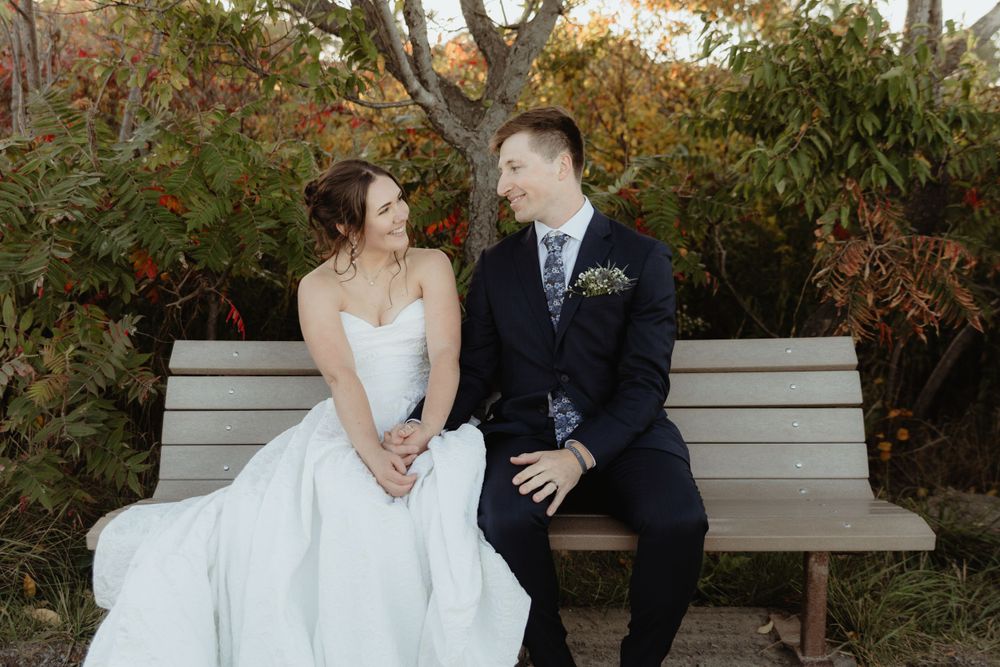 Coastal Maine elopement with bride and groom staring lovingly at each other.