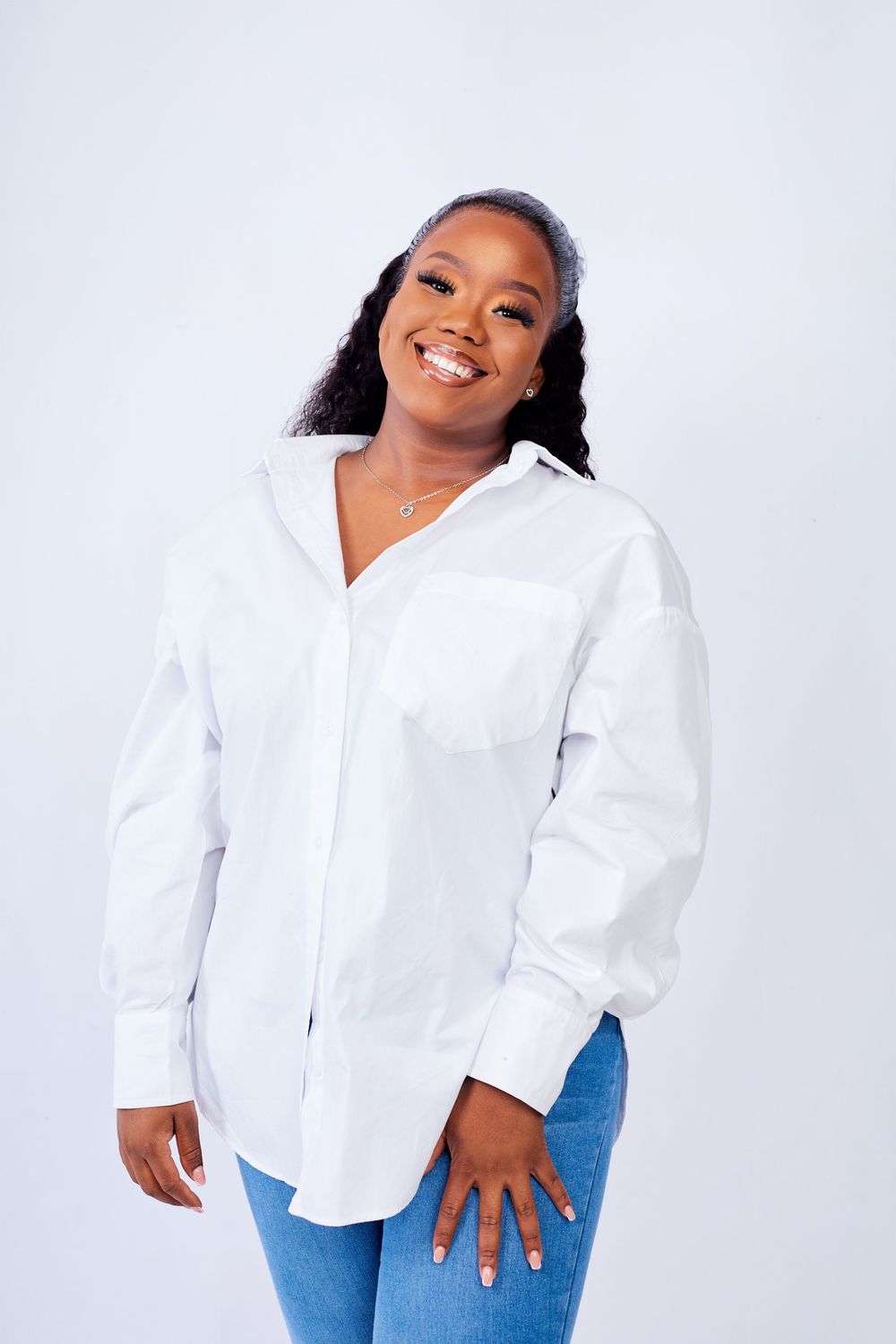 Casual fashion photo series showing a white button-down shirt paired with blue jeans.