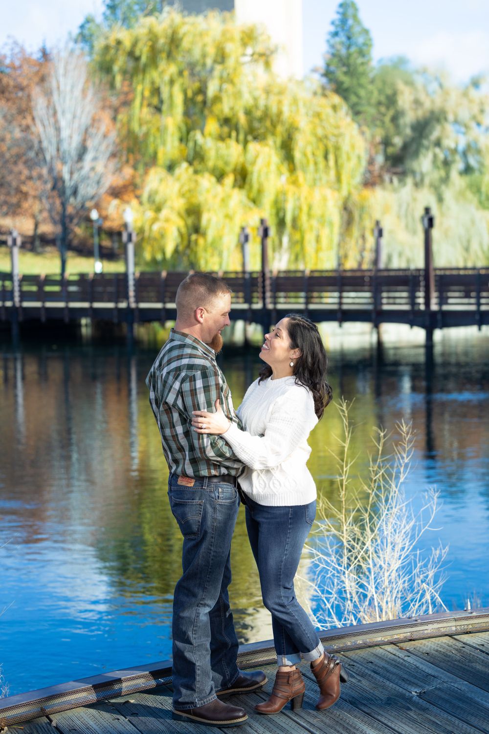 Couple engagement photography at park.