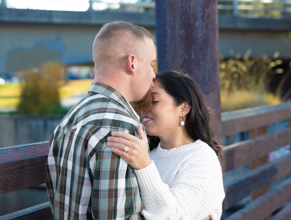 Couple engagement photography at park.