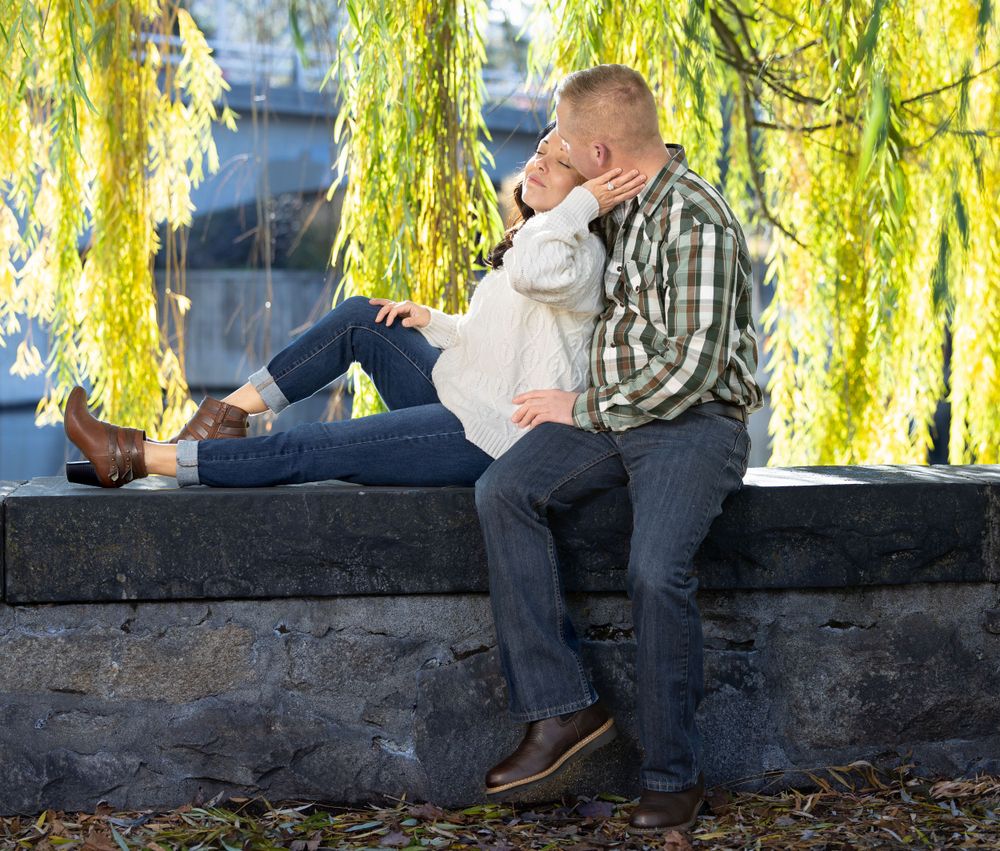 Couple engagement photography at park.