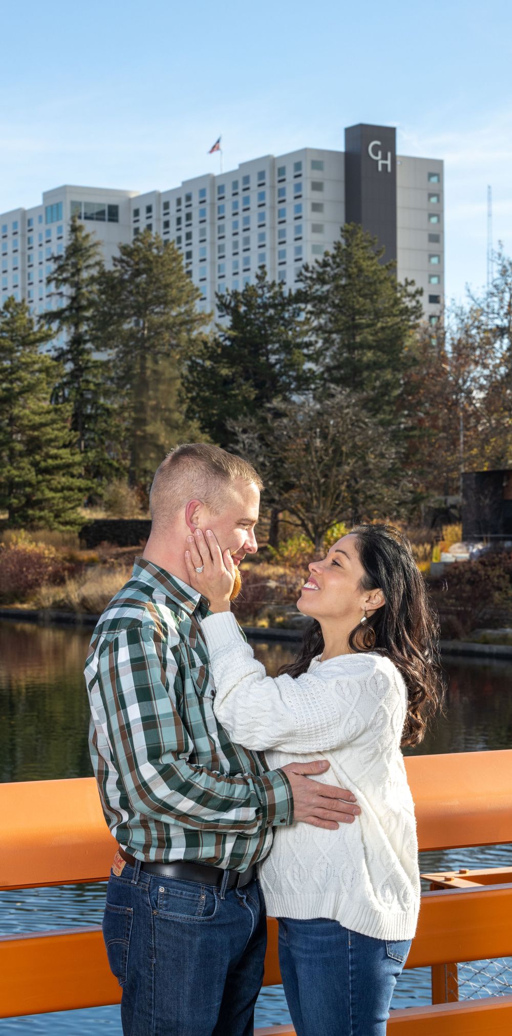 Couple engagement photography at park.