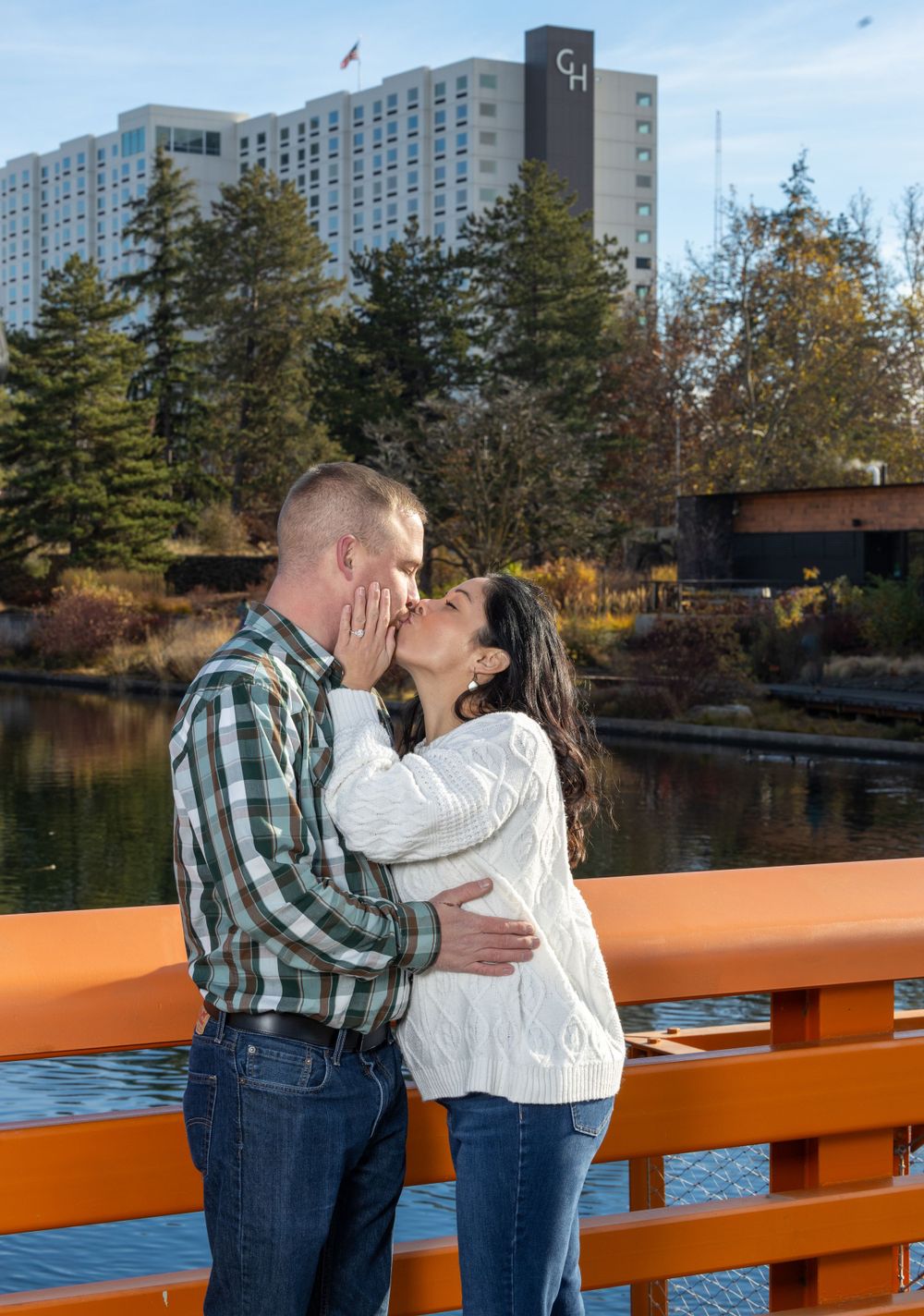 Couple engagement photography at park.