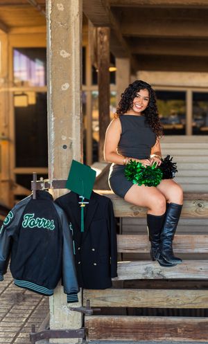 A series of graduation photos showing a person in a black dress and boots posing with green pom poms on wooden steps. Fort worth dallas phot