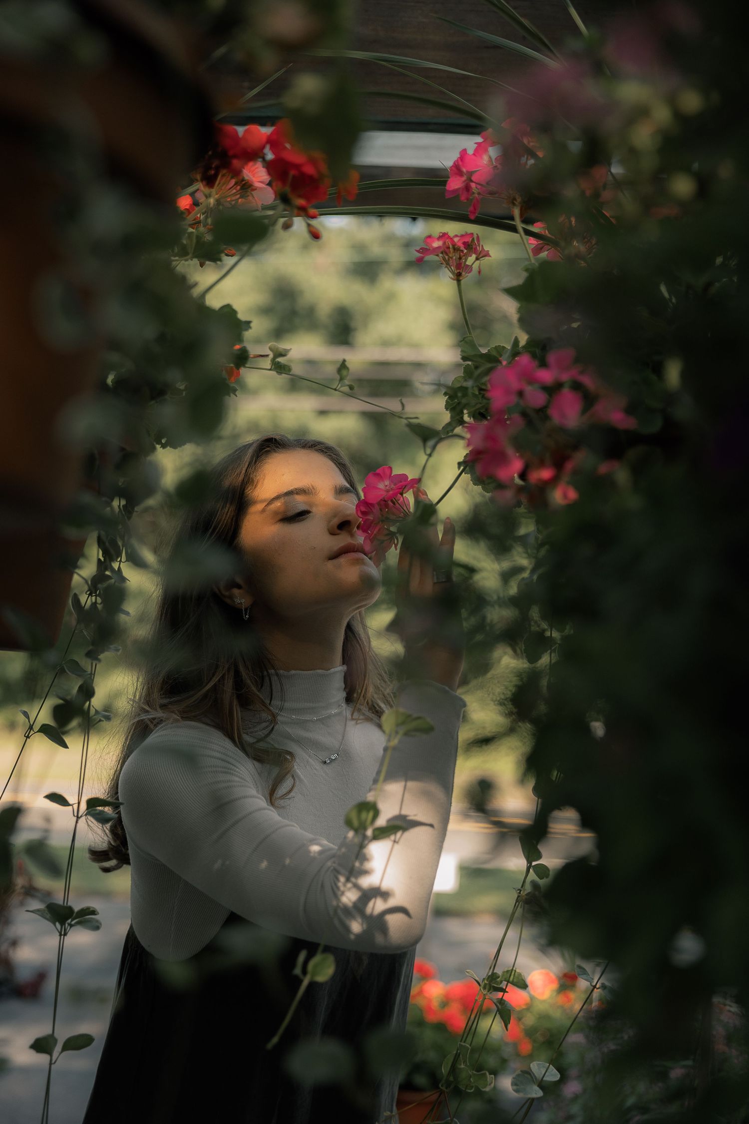 girl smelling flower photography in Lakewood NJ