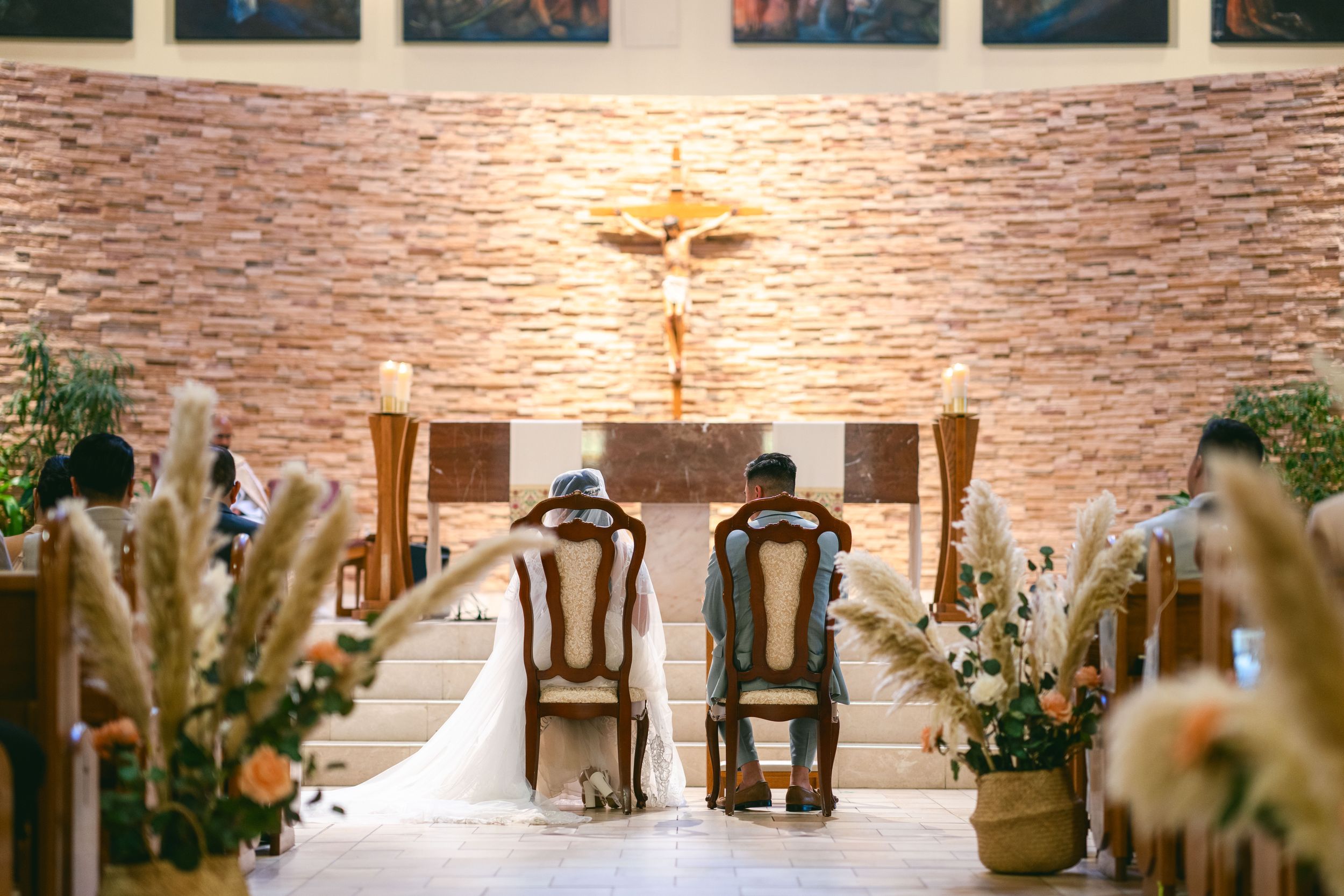 Couple facing the altar.