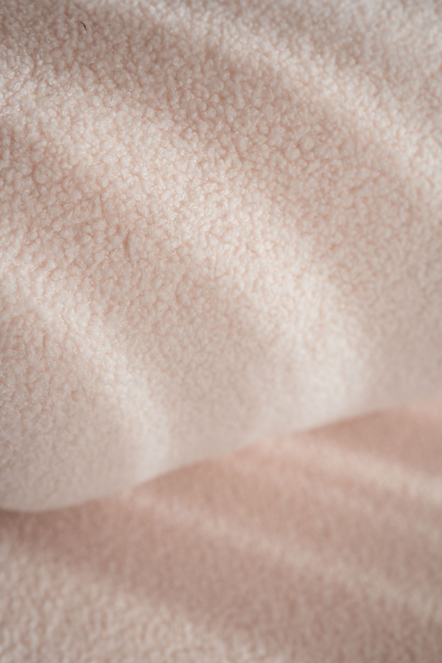 Weiches Stoffdetail in sanften Tönen, Foto aus dem Fotostudio capthevibe