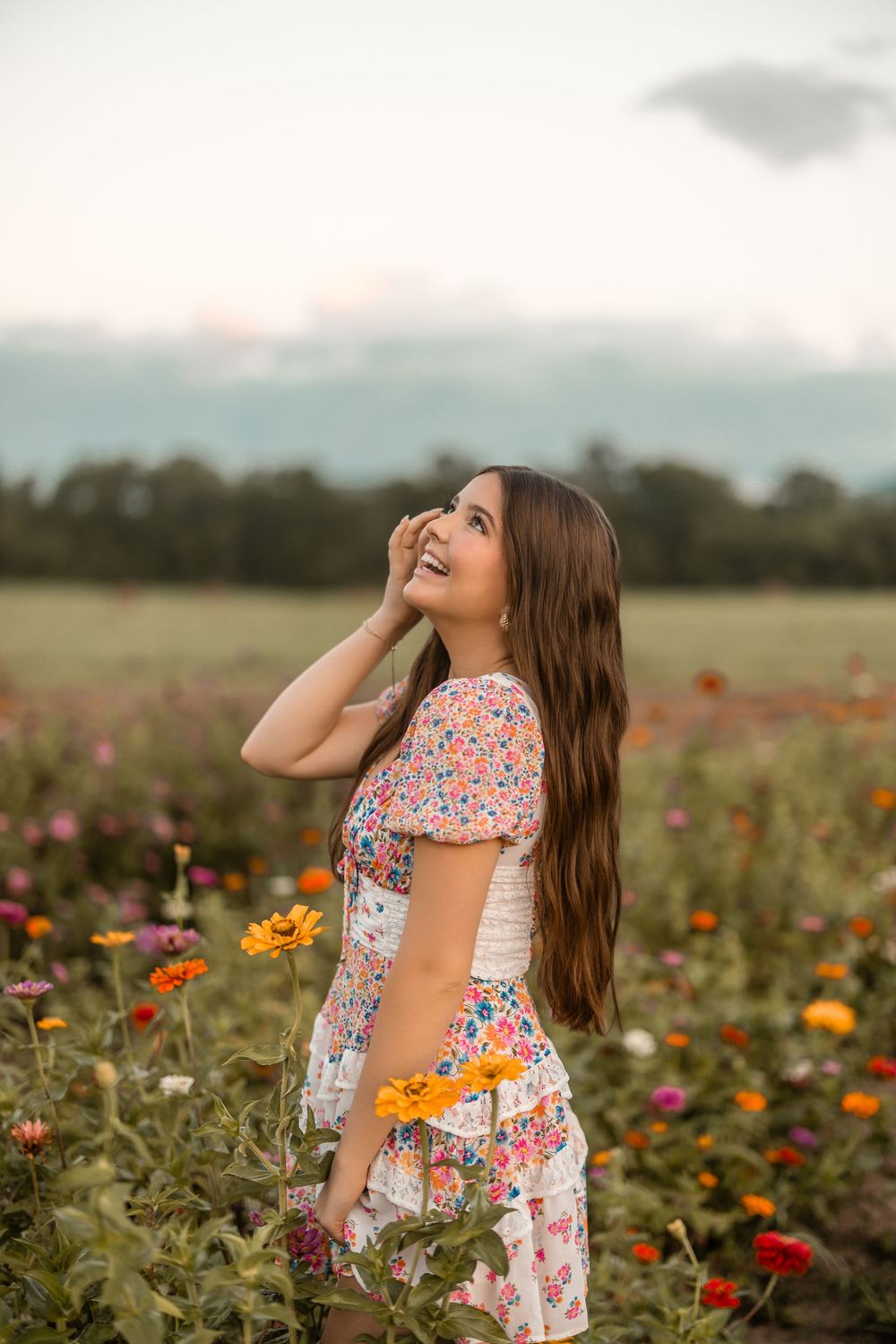 A joyful moment captured in a vibrant wildflower field filled with orange and red blooms during golden hour.