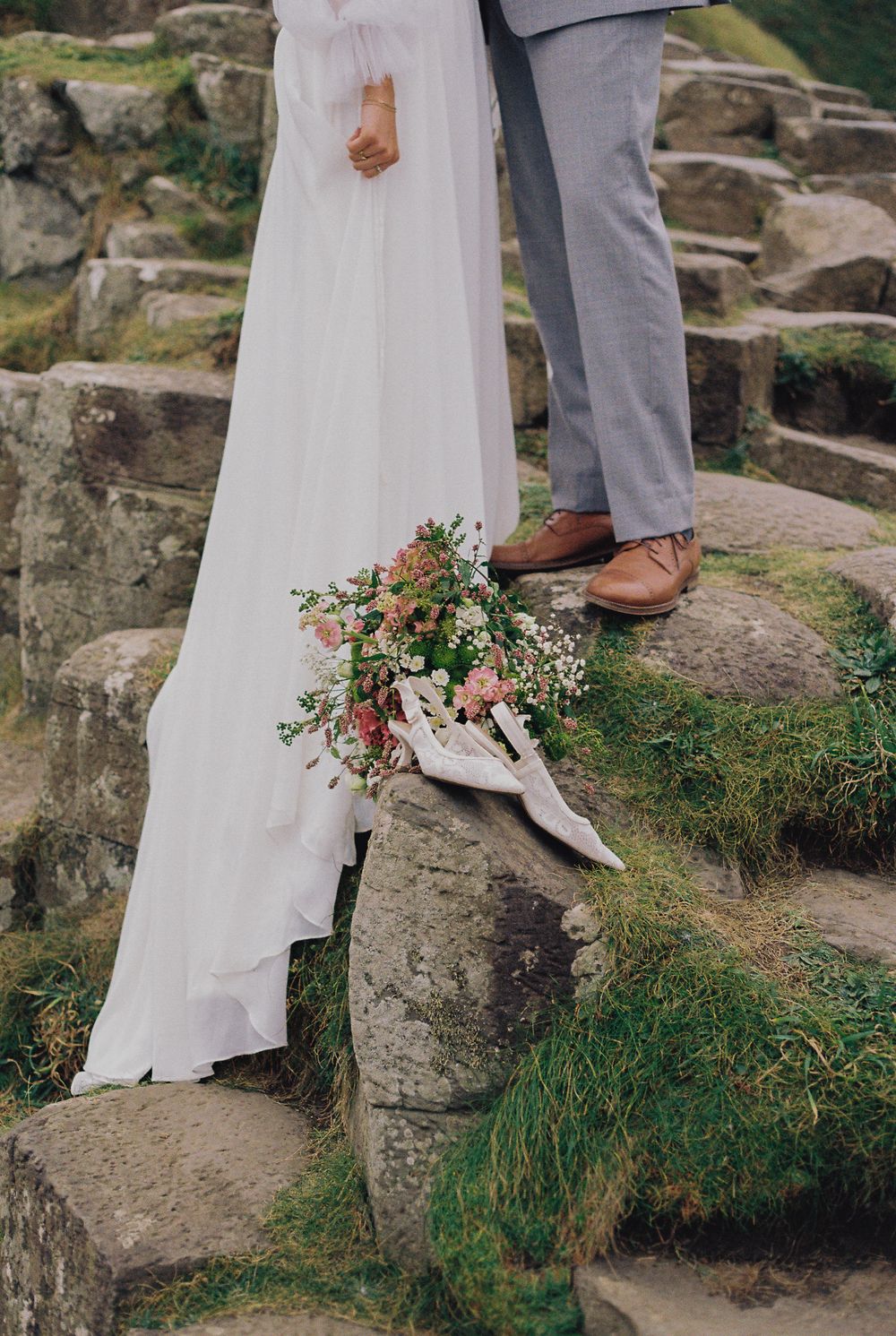 elopement details captured on film at giant's causeway in northern ireland
