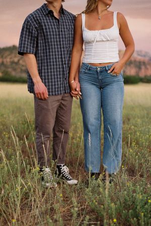 Couples film photo of their outfits in Zion
